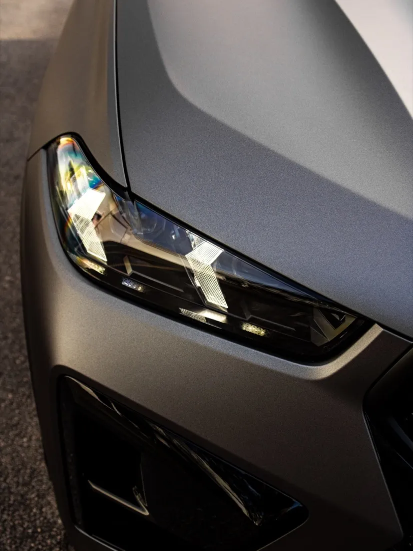 Headlight detail: film laid edge to edge around the light